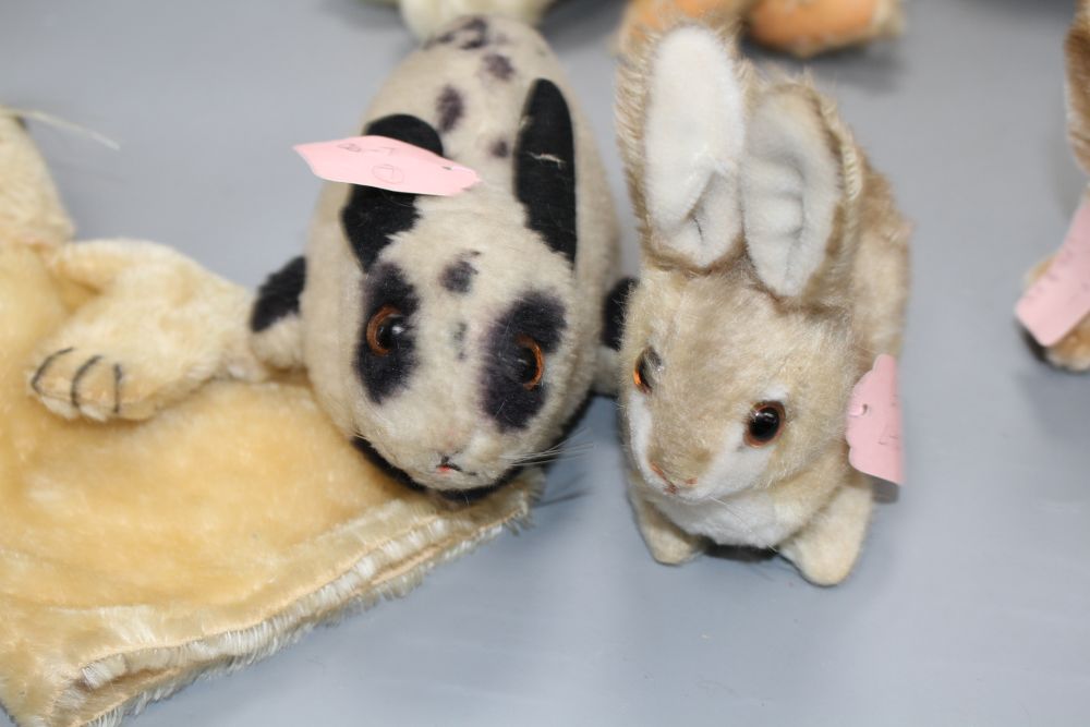 A collection of mostly Steiff soft toy rabbits